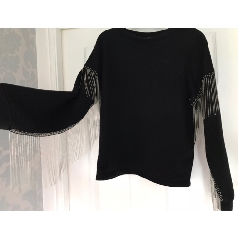 black crew neck with silver tassels